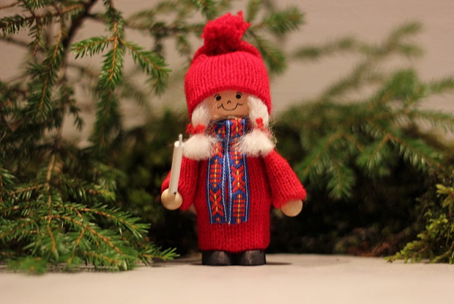 Tomteflicka med ljus